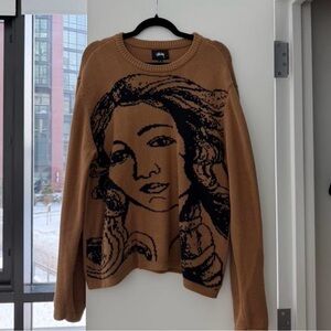 Stussy Brown Sweater with Artistic Face Design